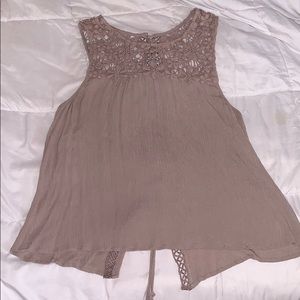 tan tank top that laces up the back.